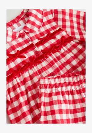 Set de pijamale din material gingham roșu și alb, cu guler, fundițe din catifea roșie pe față și detaliu de buzunar cu talie elastică.