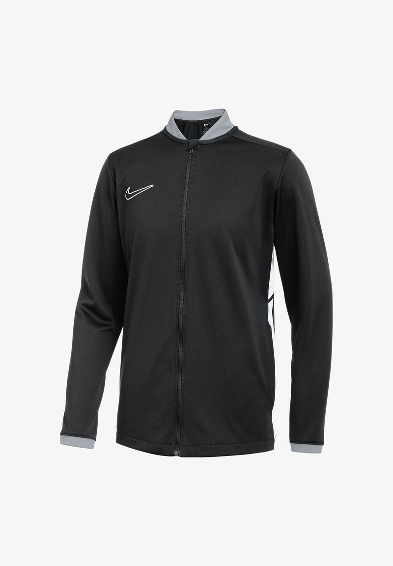 Black Nike jacket with long sleeves, a full zip front, gray collar, and white logo. Features contrast side panel and textured fabric.