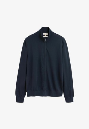 Jūras spēku krāsas zip-up krekls ar augstu apkakli, ribinātiem piedurknēm un apakšmalu. Izgatavots no mīksta, teksturēta auduma, ar tīru priekšpusi.