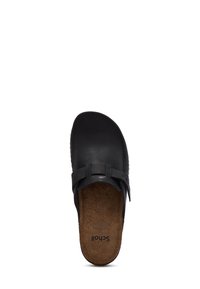 Svart läder slip-on klog med justerbar rem och minneskudds-inlägg, sedd ovanifrån mot en vit bakgrund.