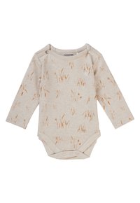 Långärmad bodysuit i mjuk beige bomull med ett mönster av gyllene gräs över hela. Har tryckknappar på axlarna och snaps i botten.