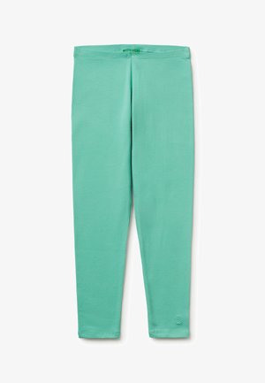 Mintgrüne weiche Leggings mit tailliertem Bund und kleinem Logo am linken Knöchel.