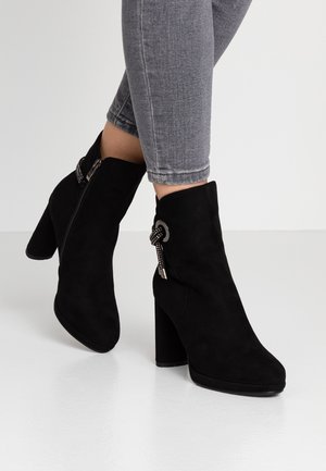 Bottines à talons hauts - black