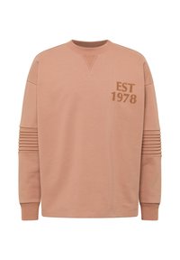 Sweat-shirt rose clair à manches longues, col côtelé et accents côtelés inclinés. Présente l'inscription "EST 1978" imprimée en ton marron.