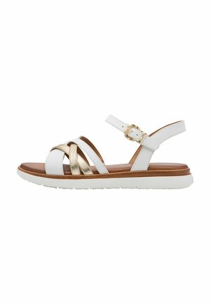 Witte en gouden sandalen met brede kruisbanden, verstelbare enkelband en een gewatteerde bruine binnenzool. Rubberen buitenzool.