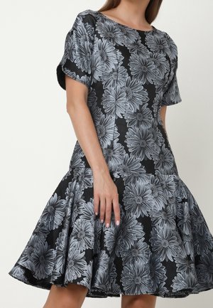 Floral dress with short sleeves, made from a black fabric featuring large gray flower patterns, flared skirt, and a smooth texture.
