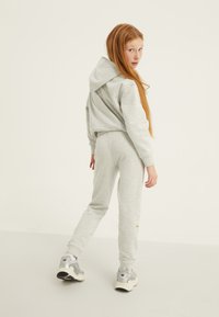 Yourturn Kids UNISEX - Tepláky - mottled light grey