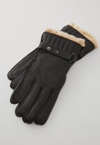 Black leather gloves with a quilted cuff, lined with beige faux fur. Features a snap button and a loop for secure fastening.