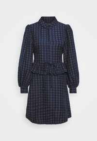 Mustikka- ja siniharmaa ruudullinen mekko, jossa on nappikaulus, puffihihat, peplum-vyötärö ja nyörivyö. Puuvillakankaan rakenne.