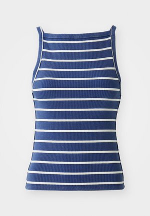 Rebrasti top bez rukava u tamnoplavoj boji s bijelim horizontalnim prugama. Ima okrugli izrez i prilagođen dizajn. Izrađen je od rastezljivog materijala.