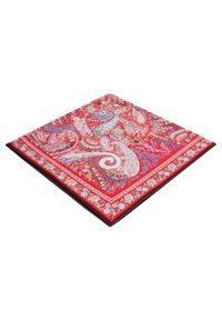 Red patterned scarf featuring intricate paisley designs in various colors, bordered with floral motifs and a contrasting edge.