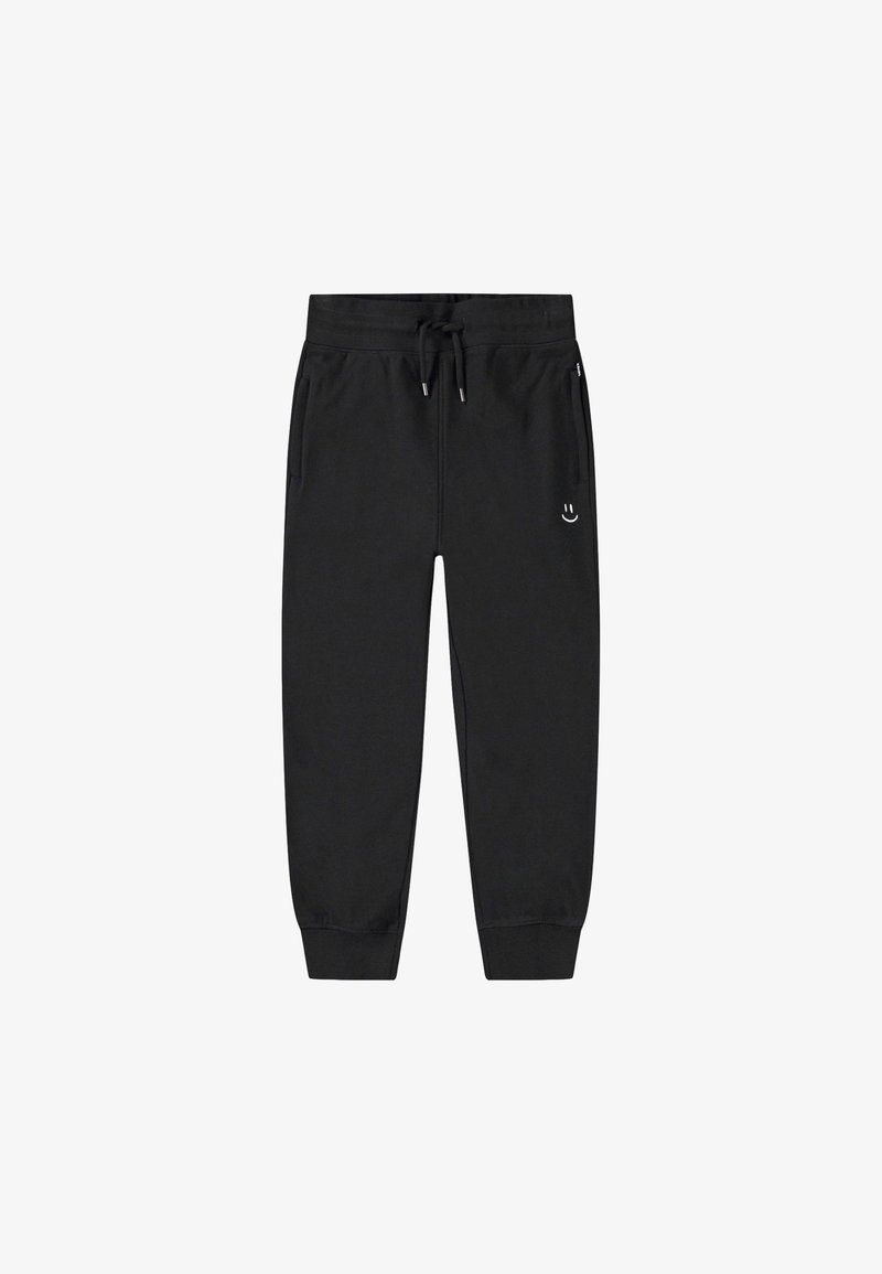 Mustad mustad püksid, millel on nööripadja, kitsenevad sääred, küljetaskud ja väike valge naeratav nägu logo vasakul reiel.