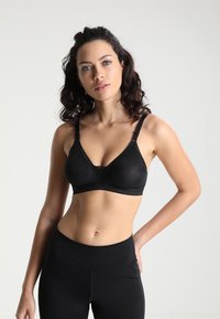 triaction by Triumph - TROPHY NON WIRED - High support sports bra - black Thumbnail Image 1