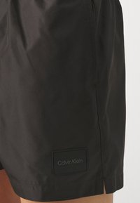 Calvin Klein Swimwear DRAWSTRING - Badeshorts - black