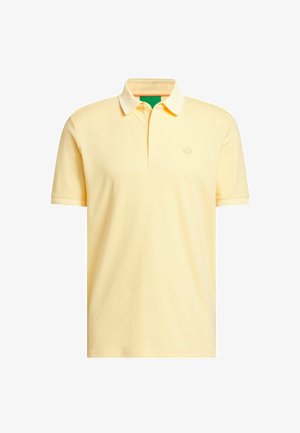 Yellow polo shirt made of cotton, features a classic collar, three-button placket, and a small embroidered logo on the chest.