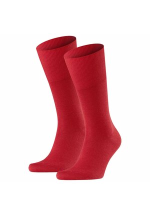 Pair of plain red crew-length socks with ribbed cuffs, displayed upright against a white background.