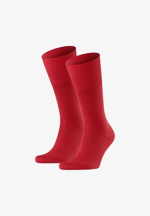Pair of plain red crew-length socks with ribbed cuffs, displayed upright against a white background.
