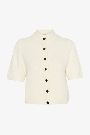 Short-sleeve cardigan in cream textured fabric with a high collar, featuring six black buttons down the front for closure.