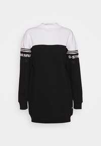 Svart och vit långärmad sweatshirtklänning med hög halsringning och G-STAR RAW-logotyp på de övre ärmarna.