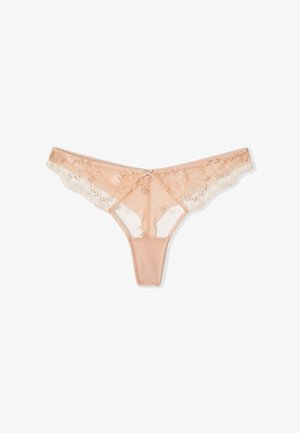 Tanga de encaje nude transparente con bordado floral y un pequeño lazo frontal, mostrado sobre un fondo blanco.