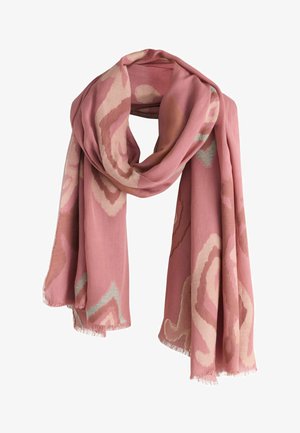Soft pink scarf with abstract light pink and beige pattern, loosely folded with fringed edges.