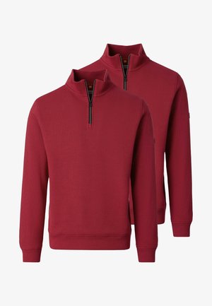 Dwie ciemnoczerwone bluzy z zamkiem na ćwiartkę, z prążkowymi mankietami i ściągaczem na dole, pokazane z przodu i z tyłu na białym tle.