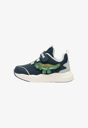 Sneaker blu navy con tomaia in rete, suola bianca e un patch a forma di dinosauro verde. Presenta una fascia in Velcro e accenti testurizzati.