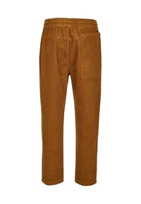 Pantalon en velours côtelé marron avec taille élastique et grande poche plaquée carrée sur le côté droit, vu de dos.