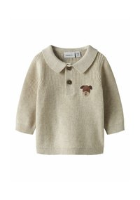 Polo beige a maglia con maniche lunghe, caratterizzata da una patta con due bottoni e un ricamo marrone a forma di cane sul petto. Materiale morbido e dalla texture. 