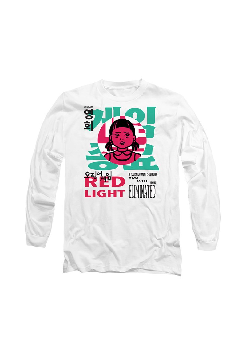 White long-sleeve shirt featuring a cartoon character with pigtails, bold text, and colorful prints in pink and green.