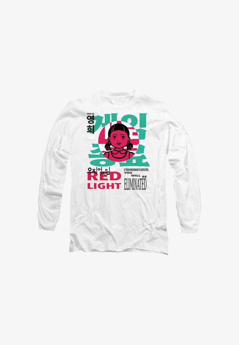 White long-sleeve shirt featuring a cartoon character with pigtails, bold text, and colorful prints in pink and green.