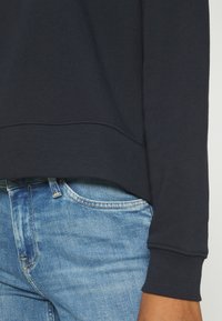 Lee Felpa con cappuccio - black