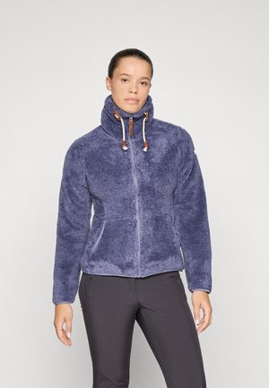 Veste en polaire de couleur violet foncé avec col haut, fermeture à glissière sur le devant, deux poches latérales et accents à cordon de serrage. Texture douce, coupe décontractée.
