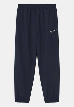 UNISEX - Tracksuit bottoms - obsidian/white