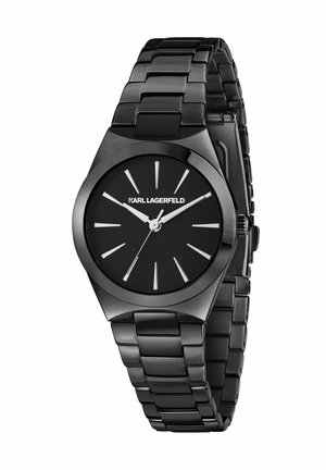 Sort ur i rustfrit stål med en elegant ottekantet urkasse, sort urskive, sølvfarvede timemarkører og et blankt ledarmbånd. Minimalistisk design.