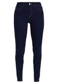 Smala jeans i mörkblå denim med hög midja, smal passform, orange sömmar och stängning fram med knapp och dragkedja.