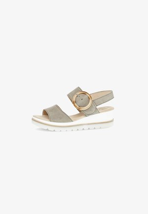 Gray suede wedge sandal with two upper straps, circular gold-tone hardware, and white rubber sole with textured tread.