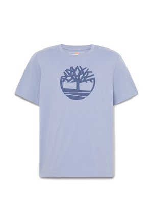 Lyseblå kortærmet t-shirt med en mørkeblå stiliseret trælogo inde i en cirkel på brystet.