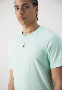 Jordan TOP - Sports T-shirts - mint foam/black