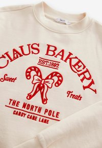 Next CHRISTMAS FRONT GRAPHIC CLAUS BAKERY - Sportinis megztinis - red ecru