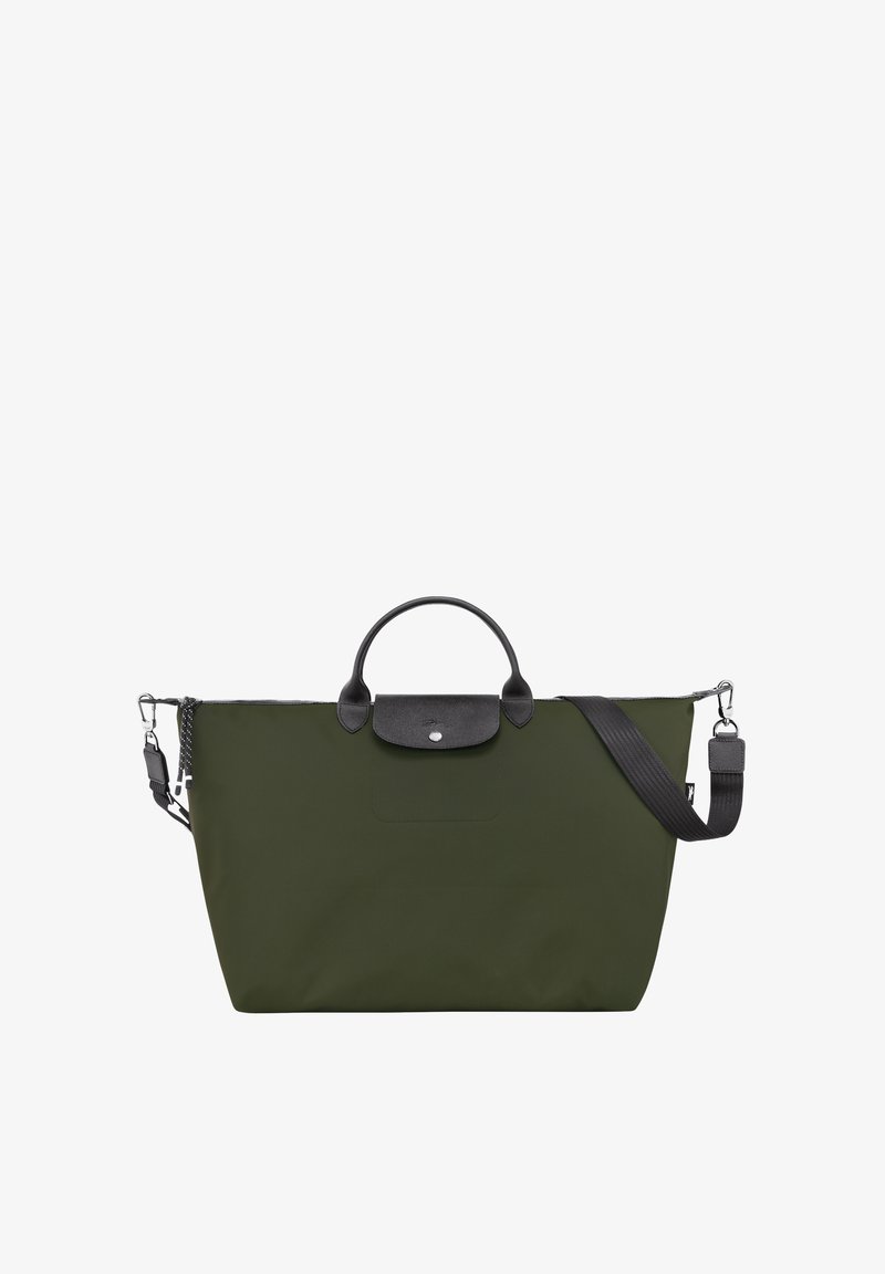 The bag features a large, rectangular design in dark green nylon, with a black leather trim and a top handle. It includes a detachable shoulder strap.