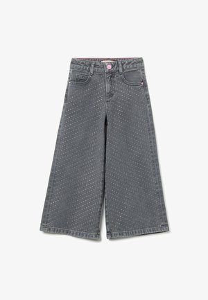 Culottes de mezclilla gris con un diseño de pierna ancha, adornados con patrones de puntos coloridos y un botón rosa en la cintura.