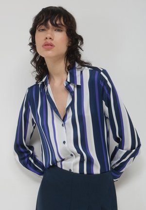 Camicia - une variante