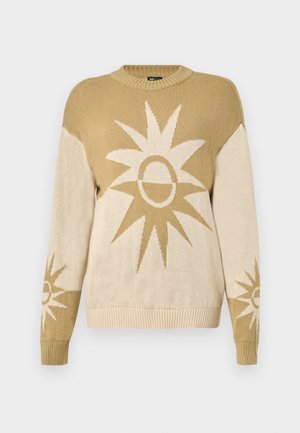 Beige and tan knitted sweater with large sun motifs, round neckline, ribbed cuffs, and hem. Textured, lightweight fabric with contrasting patterns.