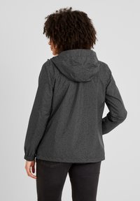 Black hooded jacket with a textured pattern, featuring long sleeves, elastic cuffs, and a relaxed fit. The fabric has a matte finish.