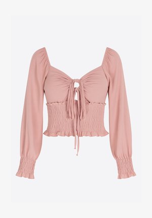 Różowy krótki top z długimi rękawami, marszczonym stanikiem i wiązaniem z przodu. Miękki materiał z falbaniastym wykończeniem na dole i mankietach.