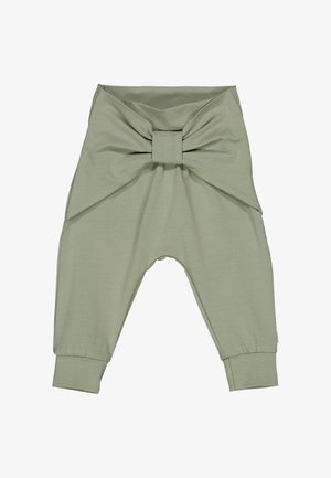 Pantaloni in misto cotone verdi con un grande dettaglio a fiocco in vita, gamba affusolata e polsini, caratterizzati da una texture liscia e un design leggero.