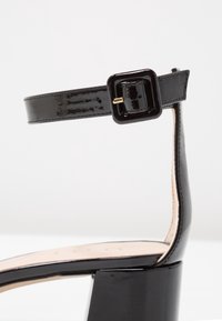 Unisa Sandales - black