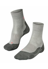 Chaussettes anklets grises avec un talon et un orteil en gris foncé contrastant. Présentent un bord côtelé et un petit logo rose sur le côté.