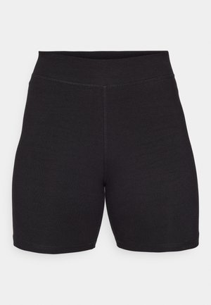 Shorts de cyclisme noirs à taille haute, fabriqués en tissu extensible et doux. Comprend des coutures plates et une texture lisse pour le confort.